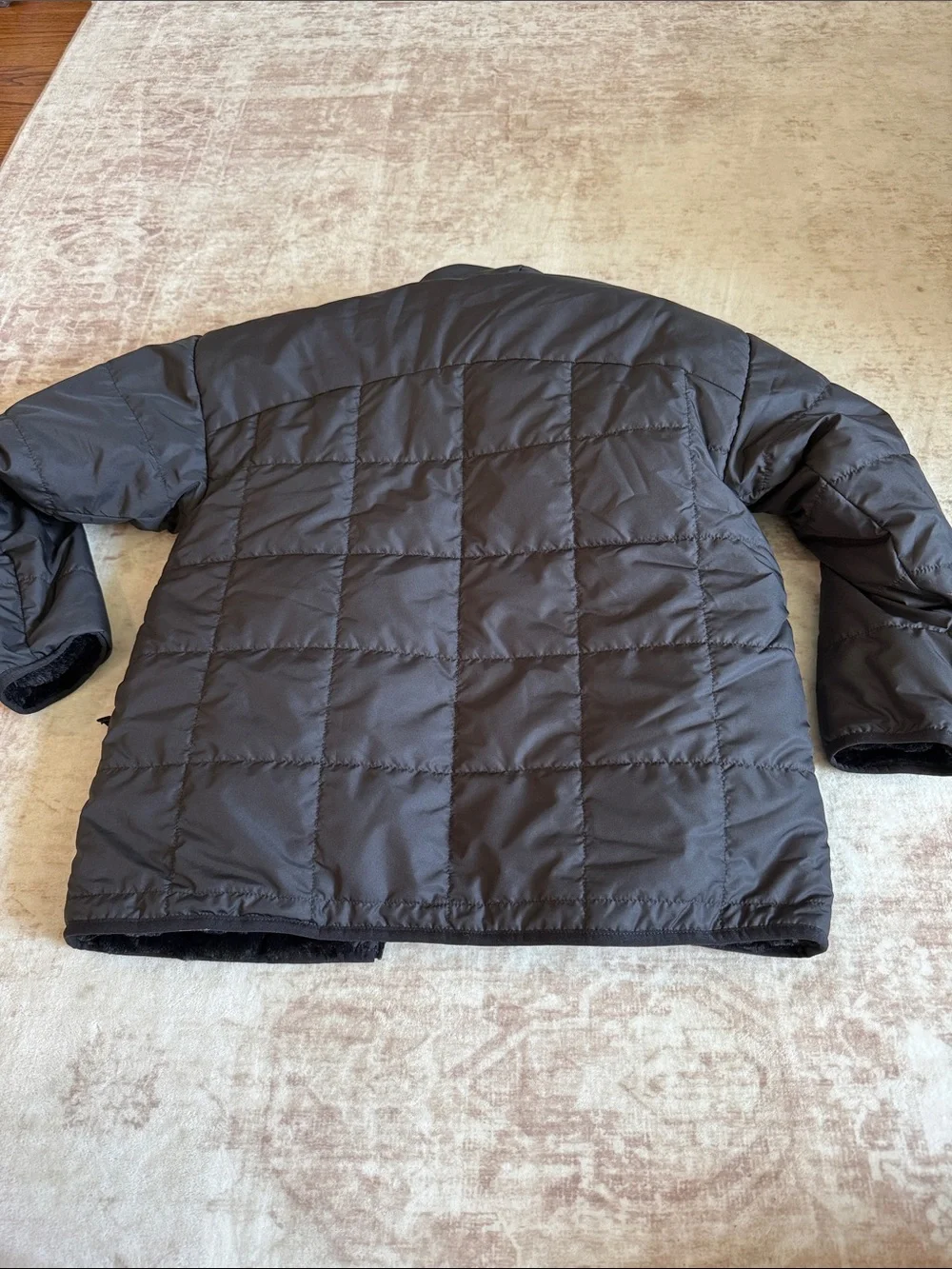 The North Face Children’s Hooded Faux-Fur Reversible Puffer Jacket in Black